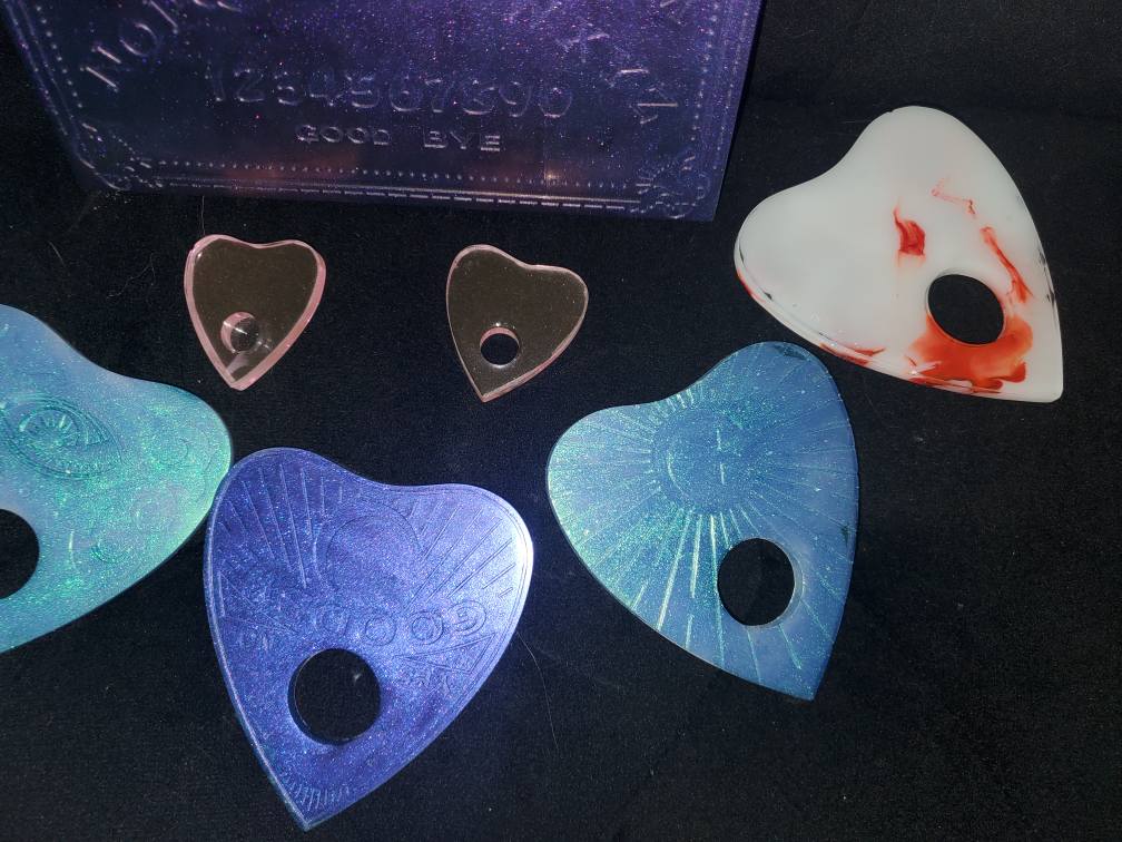Resin Ouija boards and planchettes