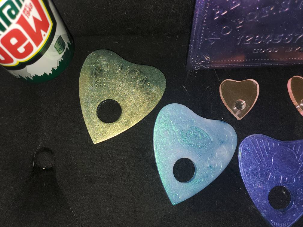 Resin Ouija boards and planchettes