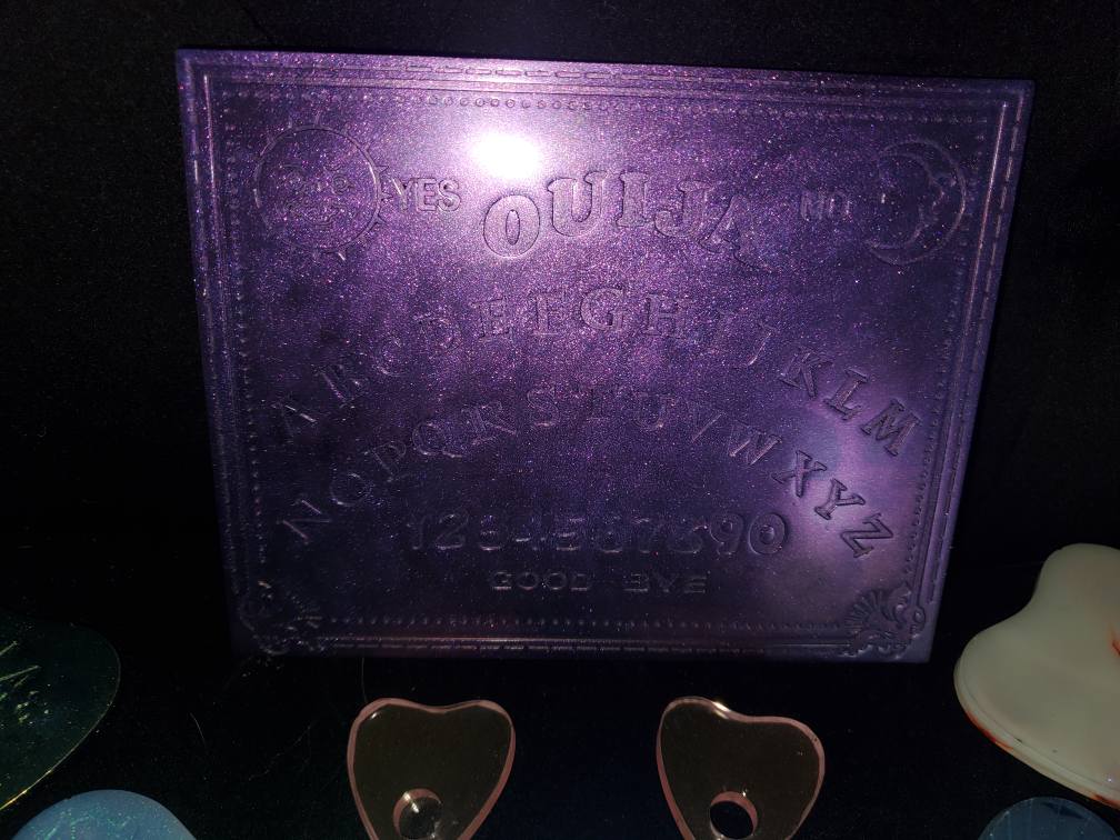Resin Ouija boards and planchettes
