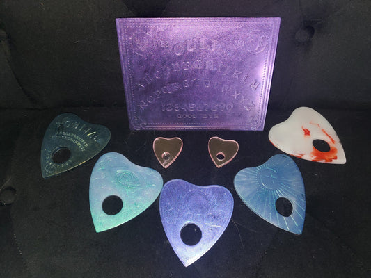 Resin Ouija boards and planchettes